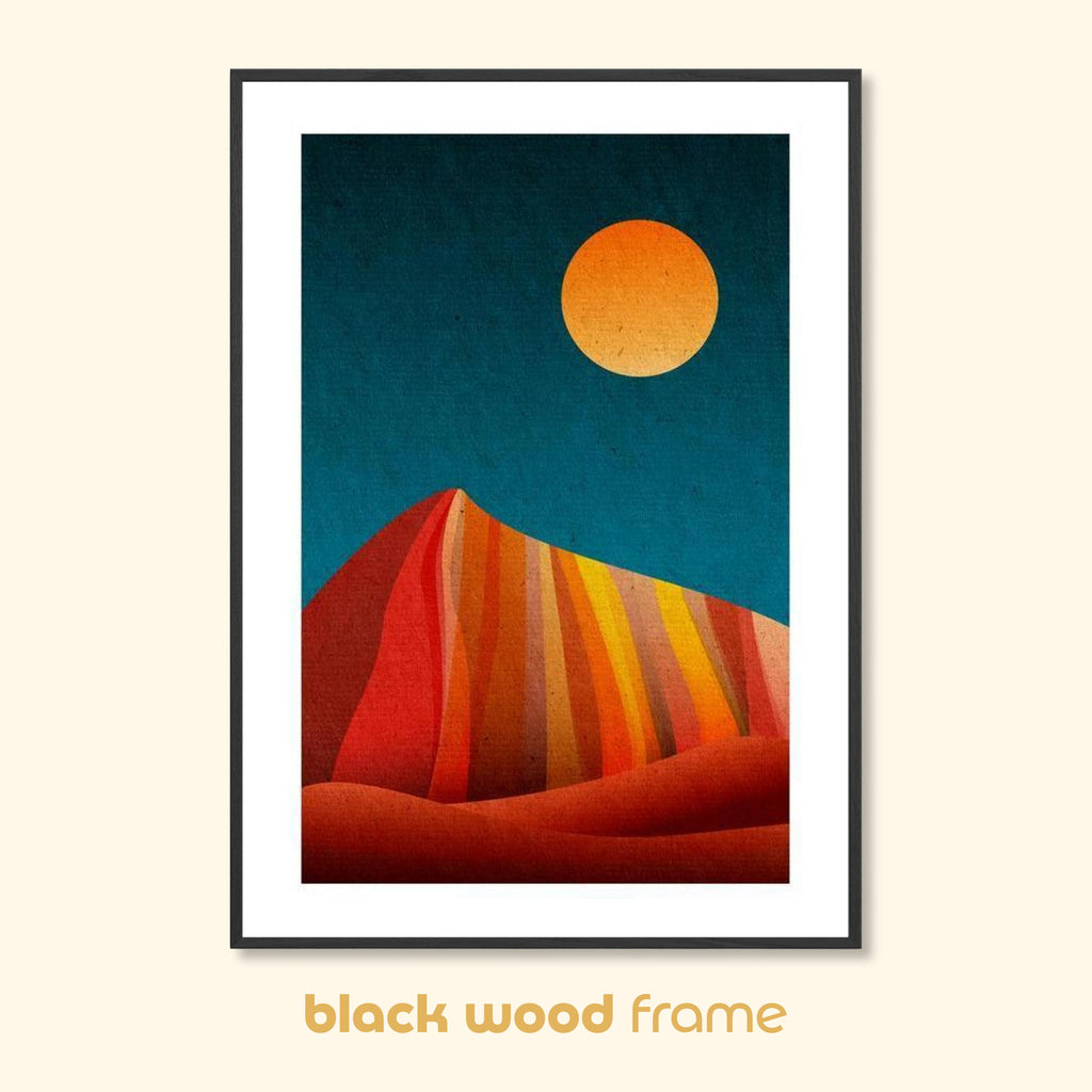 Geometric abstract print titled Warm Silence in a black wood frame, showing layered red, orange, and yellow forms beneath a circular sun on a deep blue background.
