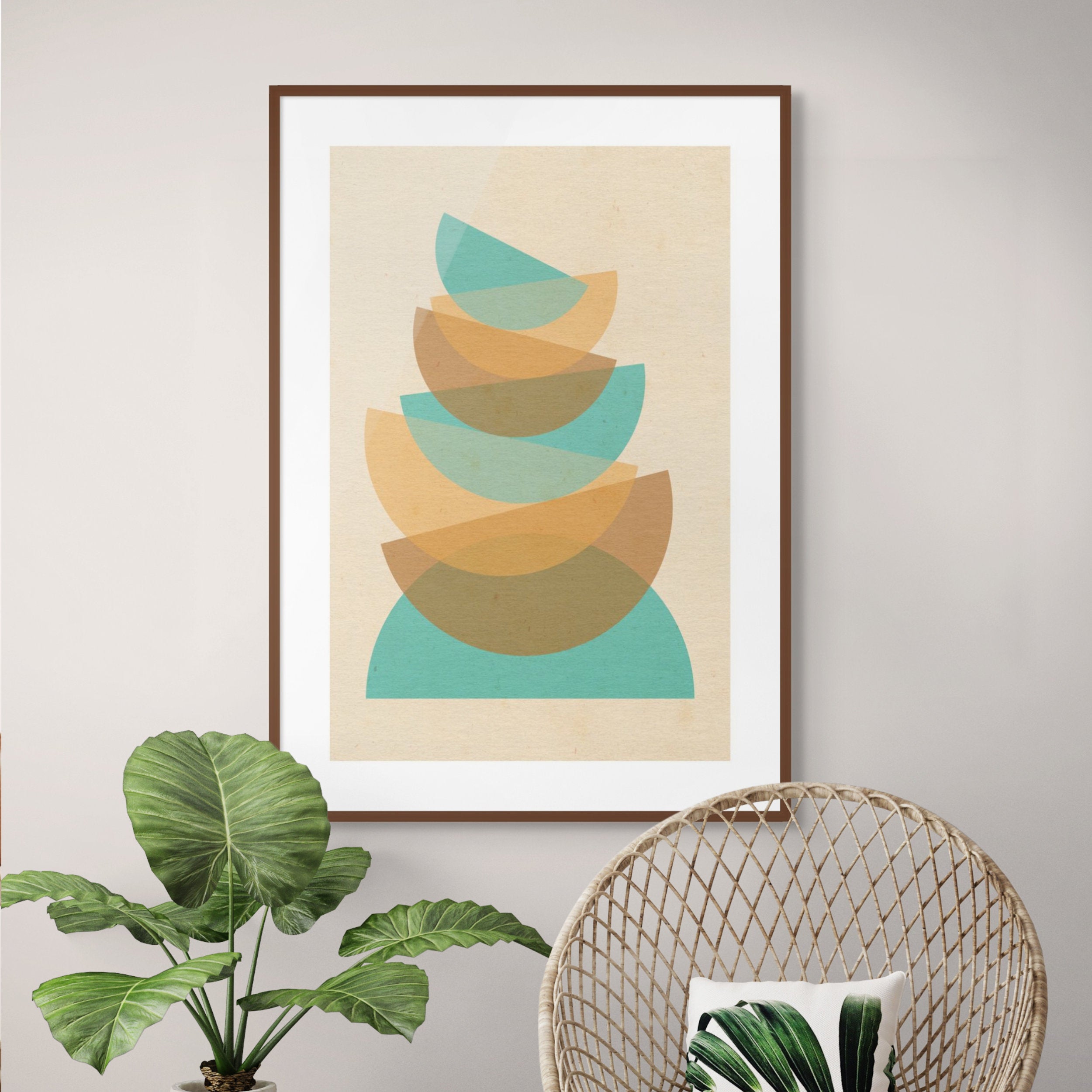 Balance geometric abstract print displayed in a calm modern interior, framed artwork with layered green and ochre curved shapes above neutral furnishings.