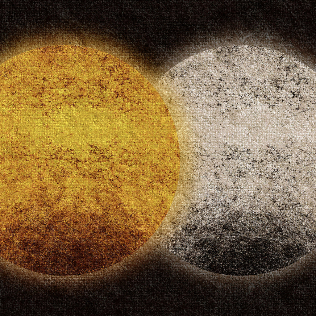 Close-up detail of an abstract sun and moon print highlighting textured golden and pale surfaces where the two forms overlap.