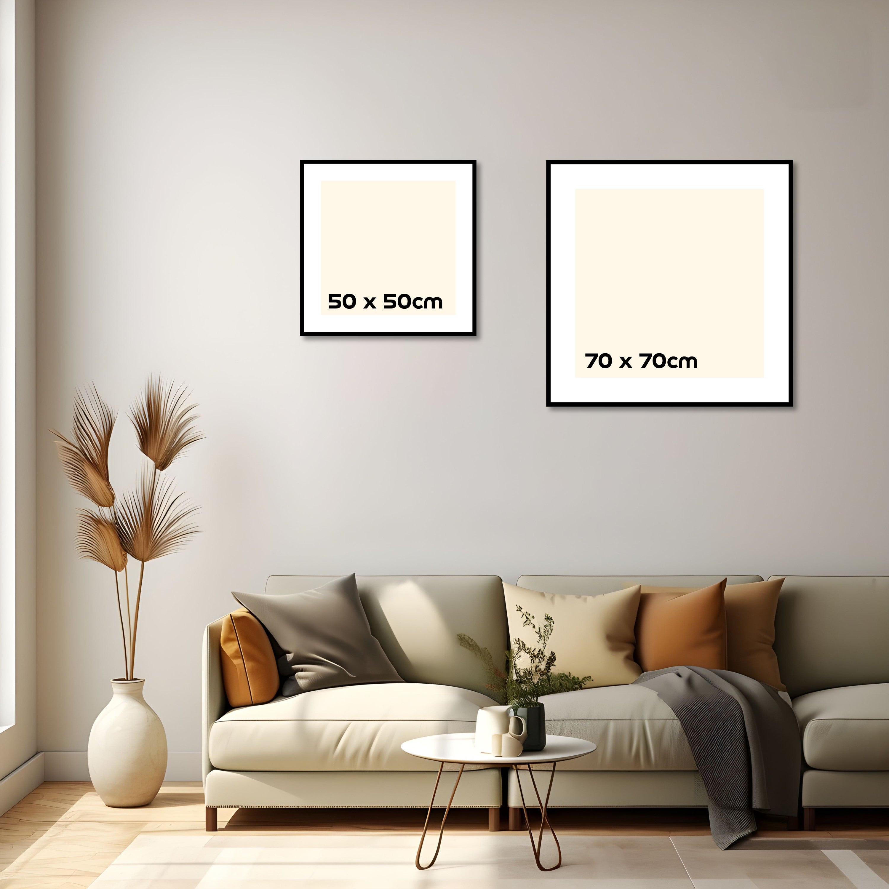 Wall art size guide showing square frame proportions for 50 x 50 cm and 70 x 70 cm prints displayed above a sofa in a modern living room.