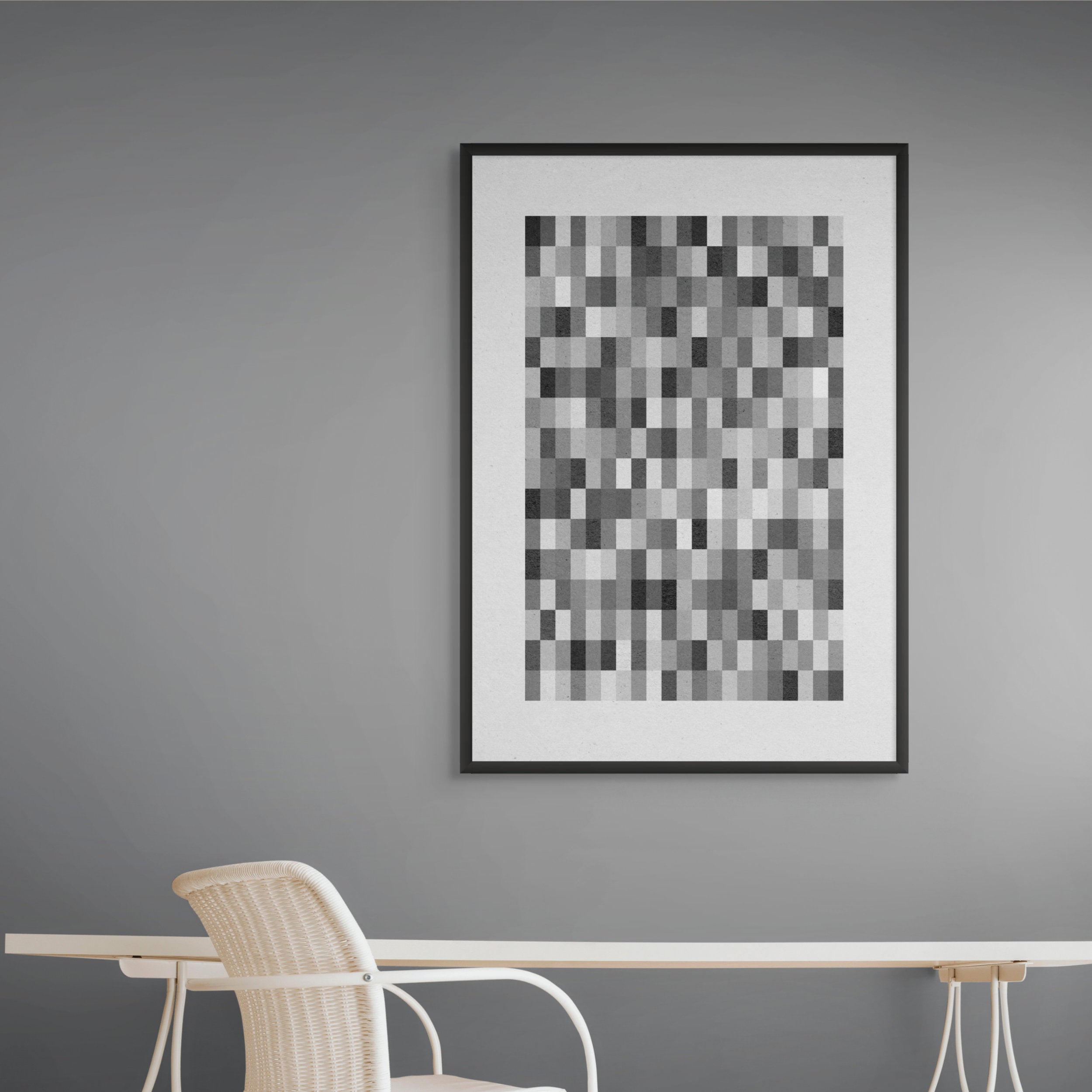 Modern monochrome abstract wall art displayed above desk in calm contemporary workspace.