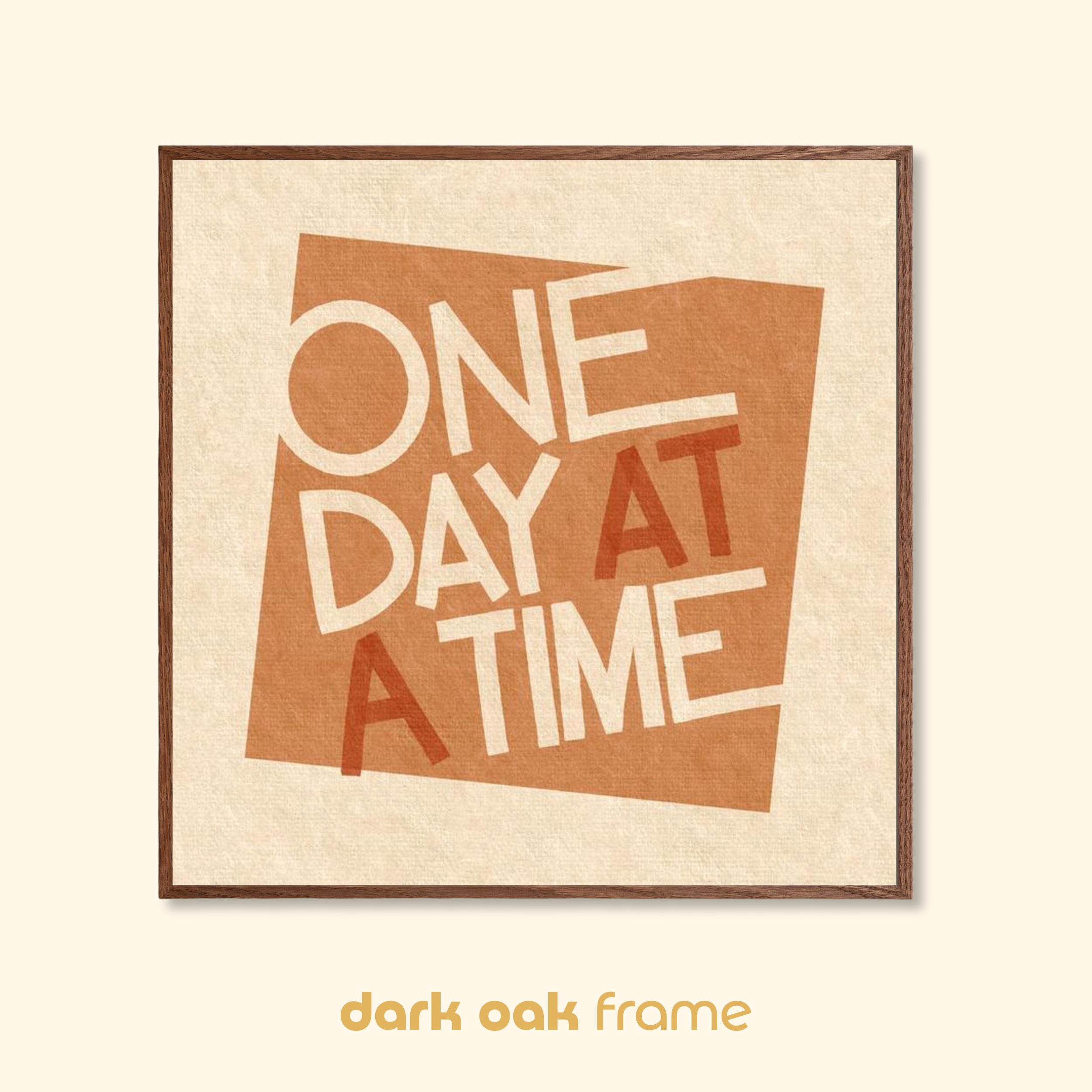 One Day at a Time mid-century style typographic print displayed in a dark oak wood frame on a light neutral background