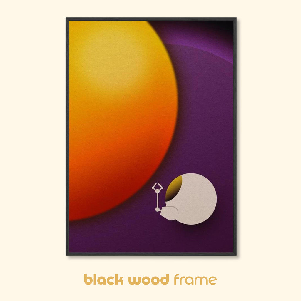 Minimalist space art print in a black wood frame featuring a lone space pod drifting beside a glowing planet